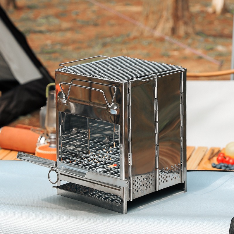 Camping Cooking Wood Stove - เตาบาร์บีคิวสแตนเลสแบบพับได้ น้ำหนักเบา พกพาสะดวก ใช้ถ่านหรือฟืน เหมาะสำหรับตั้งแคมป์กลางแจ้ง ขนาดเล็ก